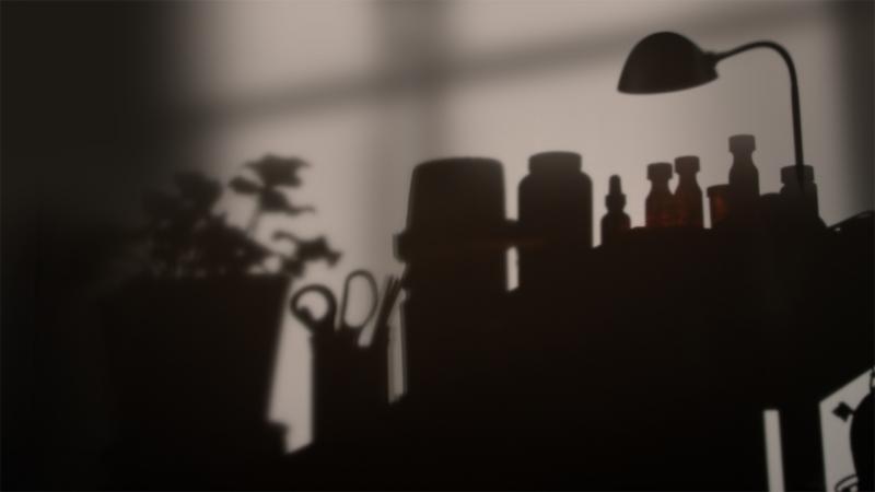 Shadows of medicine, pill bottles, a plant, a lamp, and other clutter against a wall.